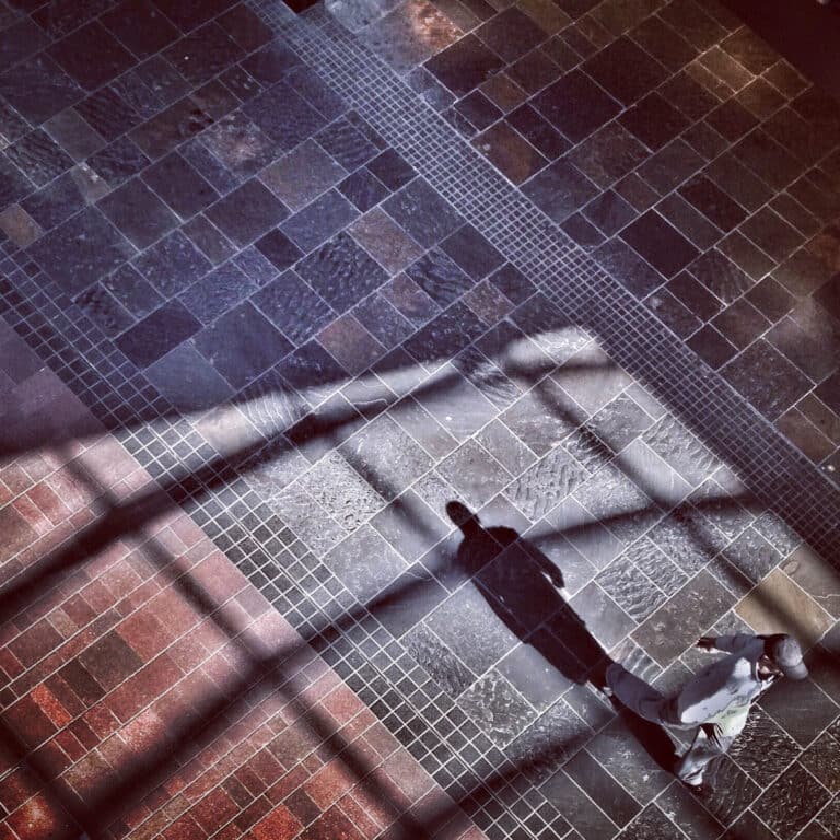 Shadow of a walking man shot on iphone